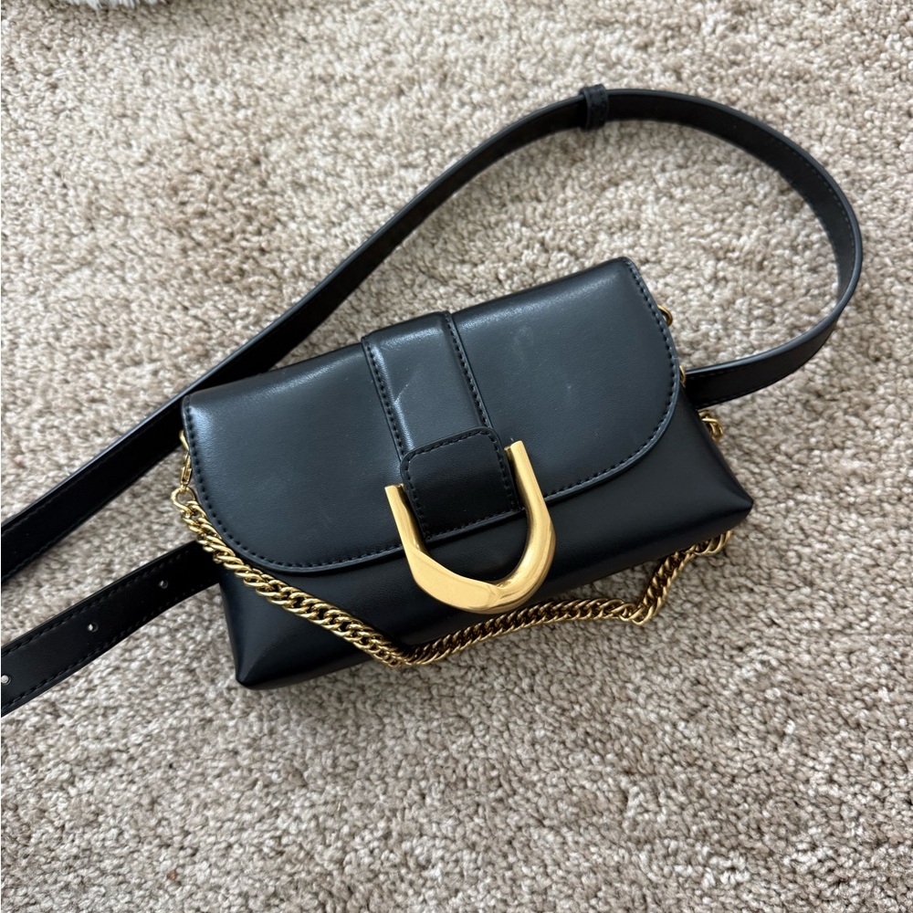 charles and keith Elegant Black Leather Bag with Gold Chain